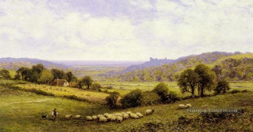 Près d’Amberley Sussex avec le château d’Arundel dans la distance paysage Alfred Glendening Peinture à l'huile